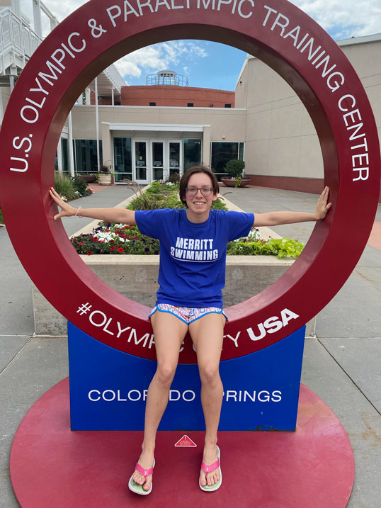 Abby Kershaw Sitting on US Olympics And Paralympics Training Center Sign